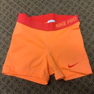 Nike pro women’s 3 inch compression shorts neon orange size medium